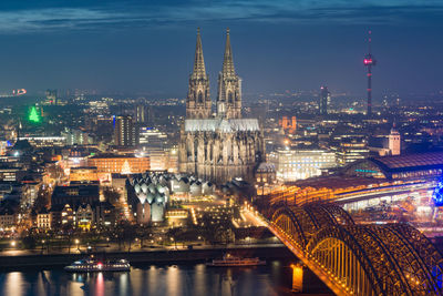 Illuminated buildings in city at night