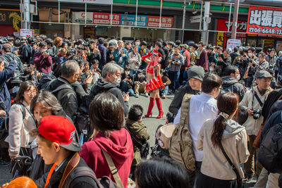 Group of people standing on street