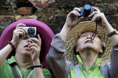 Close-up of photographer photographing