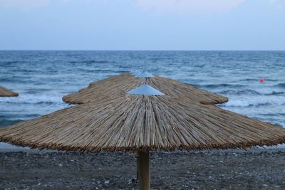 Scenic view of beach against clear sky