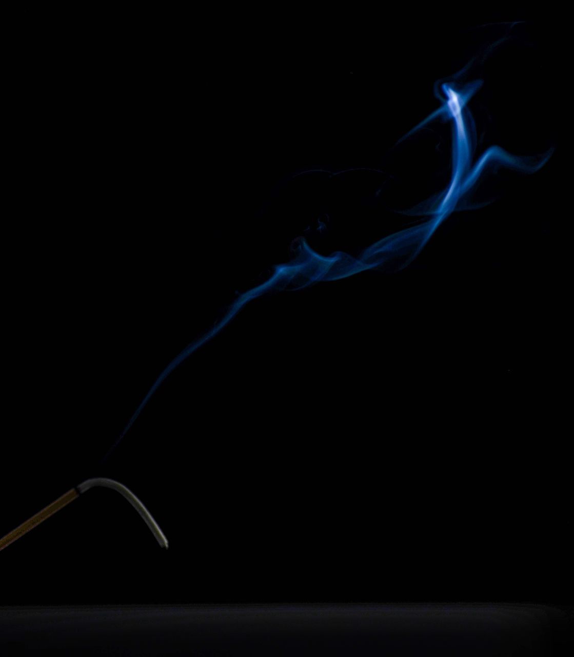 black background, studio shot, no people, motion, smoke - physical structure, close-up