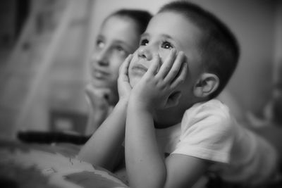 Portrait of cute boy smiling at home