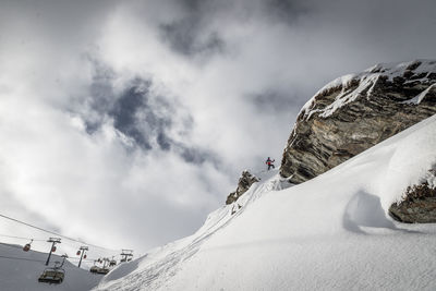 Scenic view of snowcapped mountain against sky