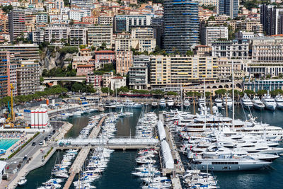 Aerial view of harbor and buildings in city