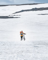 Biking across icelandic glacier