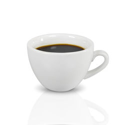 Close-up of coffee cup against white background