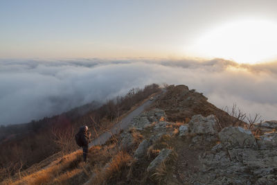 Scenic view of land against sky during sunset