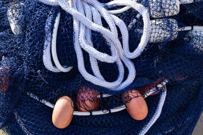 A balled-up blue professional fishing net. fishing and leisure.