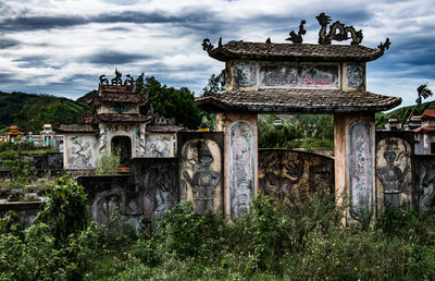 View of temple against building