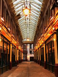 Illuminated corridor of building