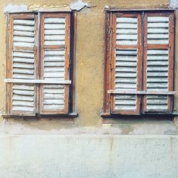 Closed window of old building