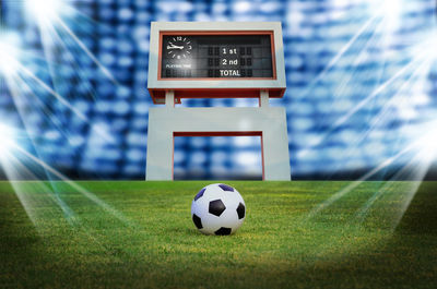 Close-up of soccer ball on field