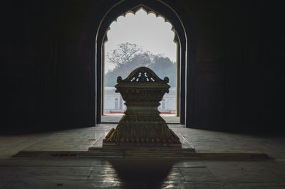 Corridor of historic building against sky