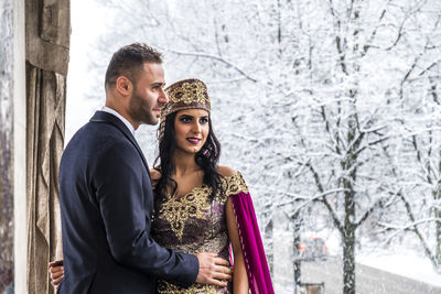 Bride with bridegroom during weeding ceremony