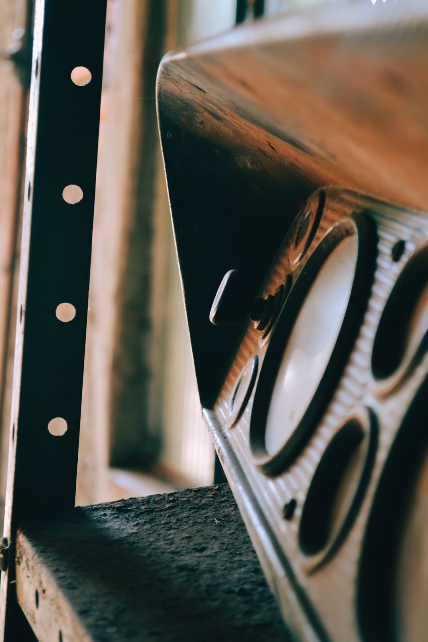 black, blue, no people, close-up, iron, indoors, glasses, selective focus, green, light