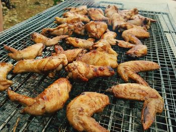 Close-up of meat on barbecue grill