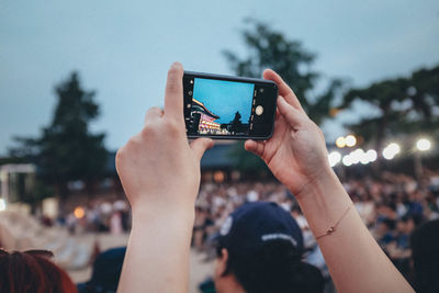 People photographing through smart phone