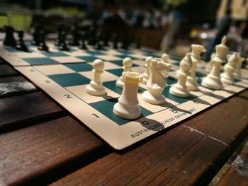 Close-up of chess pieces on table