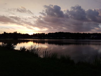 Sunset over calm lake