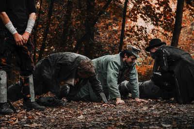 Group of people in forest during autumn