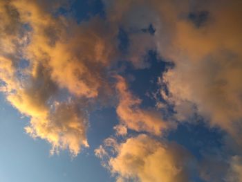 Low angle view of dramatic sky during sunset