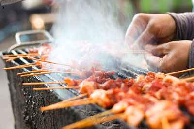 Close-up of meat on barbecue grill