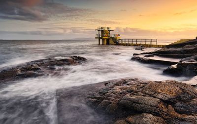 Blackrock diving tower at salthill beach in galway city, ireland