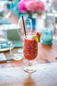 Close-up of cocktail in glass on table