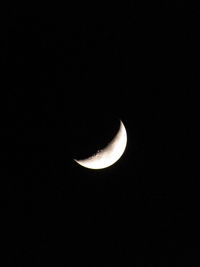 Scenic view of moon against sky at night