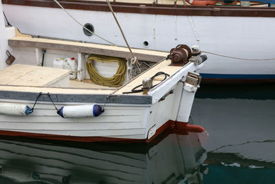 Boats moored at harbor