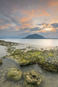 Scenic view of sea against sky during sunset