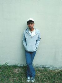 Portrait of young man standing outdoors