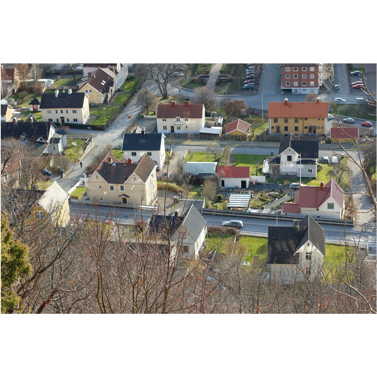 building exterior, architecture, built structure, transfer print, auto post production filter, residential structure, house, residential building, roof, tree, high angle view, residential district, city, town, day, crowded, outdoors, building, sky, no people