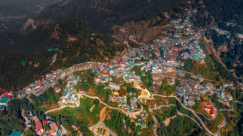 High angle view of townscape against mountain