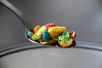 Close-up of cereals in spoon