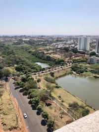 High angle view of river amidst buildings in city