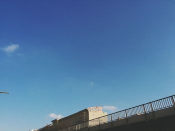 Low angle view of built structure against blue sky