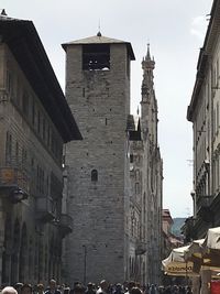 Low angle view of buildings in city against sky