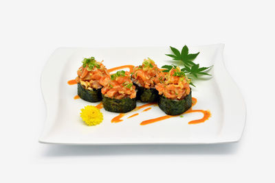 High angle view of vegetables in plate on table