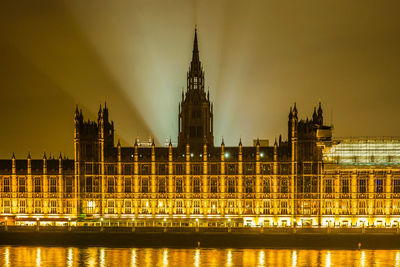 View of buildings in city at night