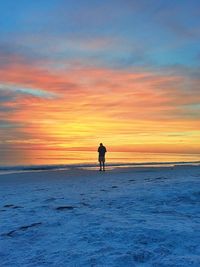 Scenic view of sea at sunset