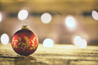 Close-up of illuminated christmas decoration on table