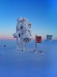 Snow covered mountain top skiing ruka