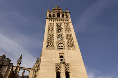 Low angle view of la giralda against sky