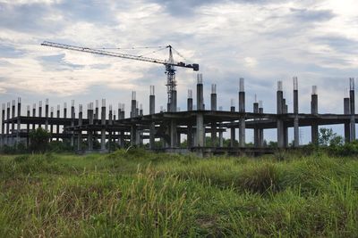 Construction site on field against sky