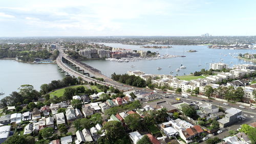 High angle view of river amidst buildings in city