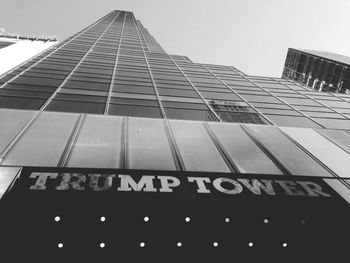 Low angle view of office building against sky