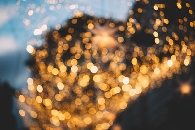 Defocused image of illuminated lights at night