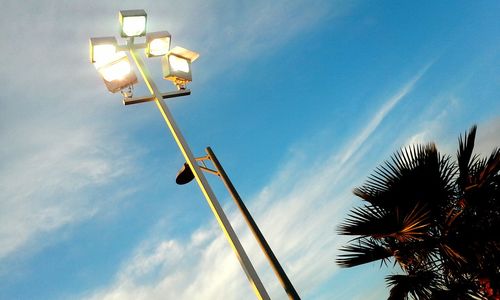 Low angle view of street light against sky
