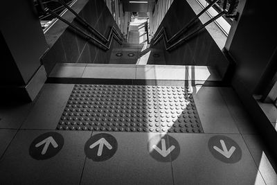 High angle view of text on escalator